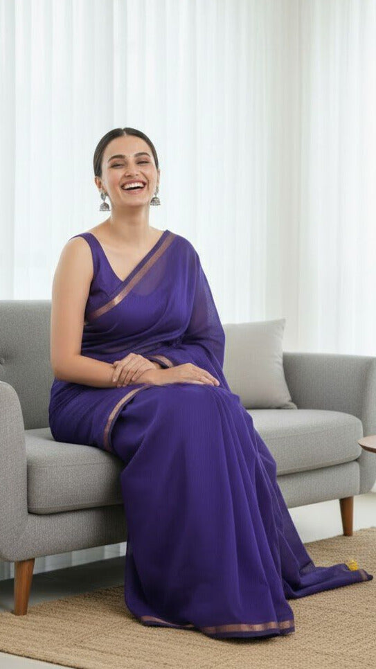 Violet -Mul cotton saree with thin jori border.